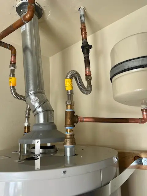 Water heater installation and plumbing repair in Upper Falls